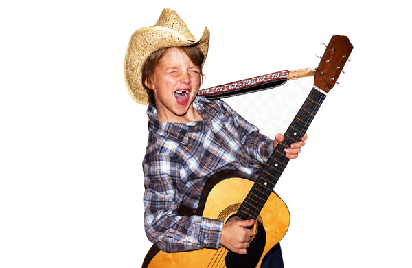 Eric at age 6 with his first guitar